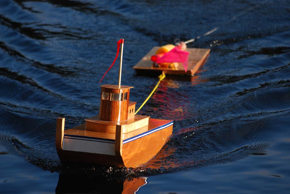 rc tugboat with barge